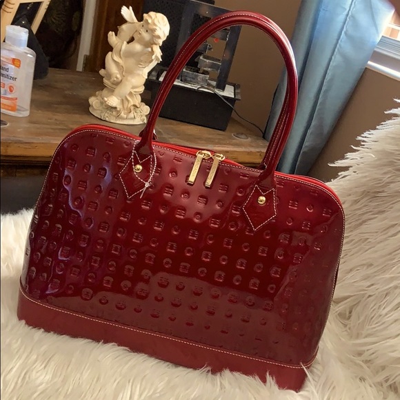 Arcadia Handbags - Arcadia patent leather wine handbag new w defects